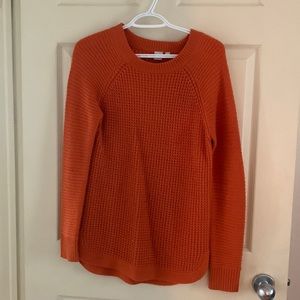 Orange knit sweater